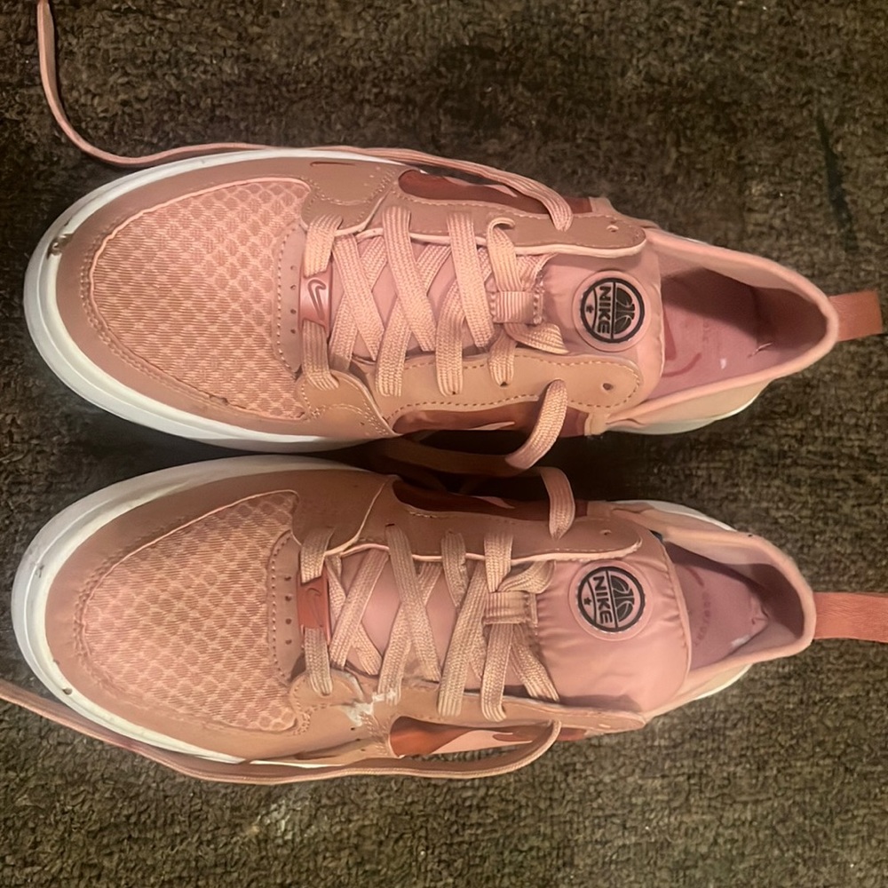 Pink and white Nike